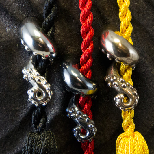 Bronze Octopus Arm Tassel Pin