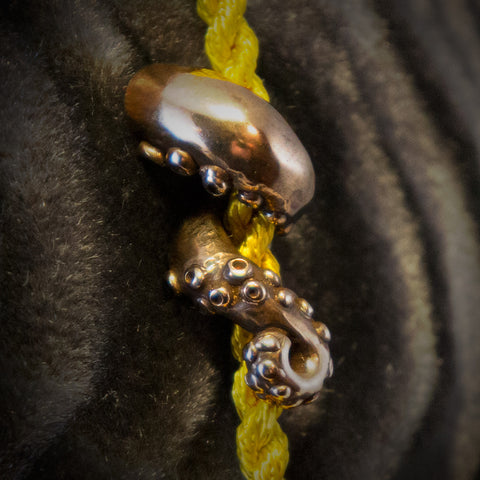Bronze Octopus Arm Tassel Pin